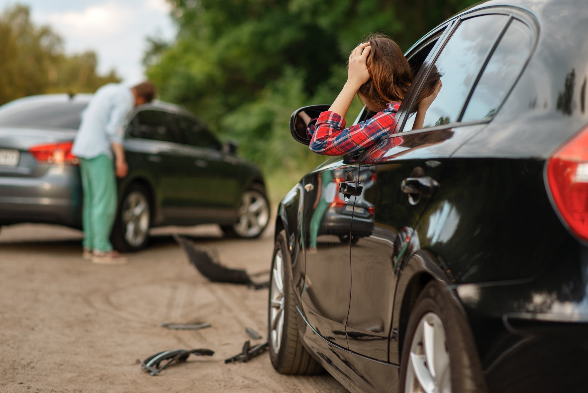Florida No-Fault Insurance, Male and female drivers after car accident on road